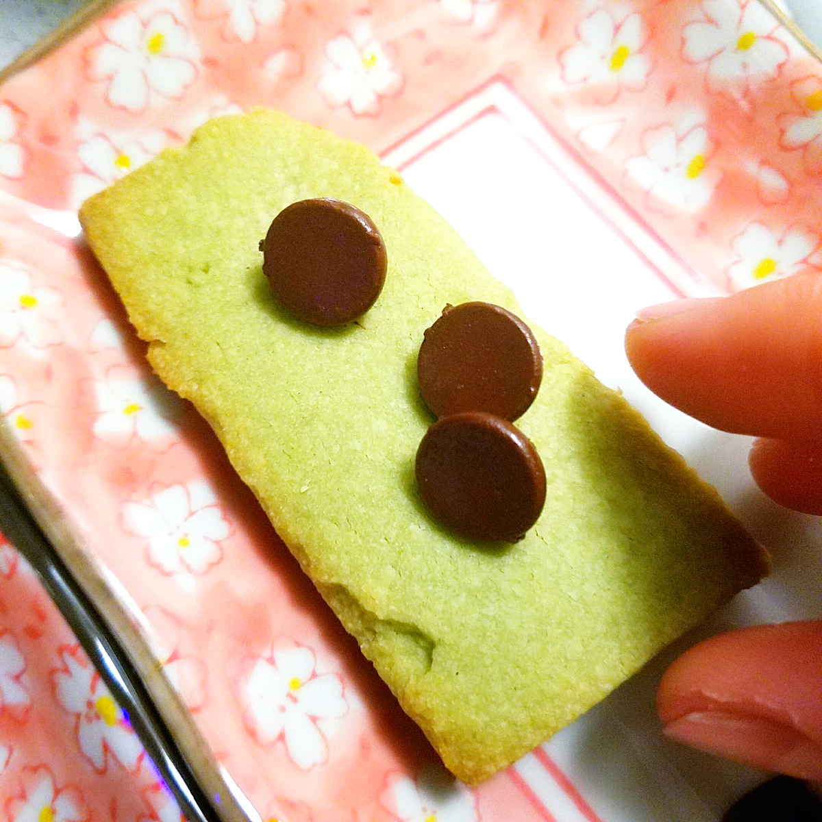 close up of a matcha shortbread cookie