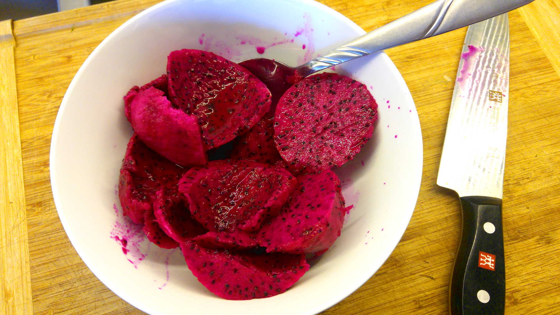 dragon fruit chunks cut up in a bowl