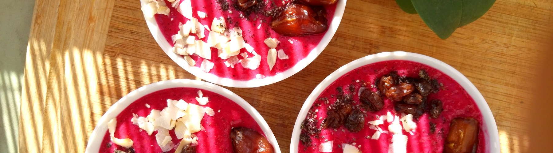 3 pitaya smoothie bowls with toppings