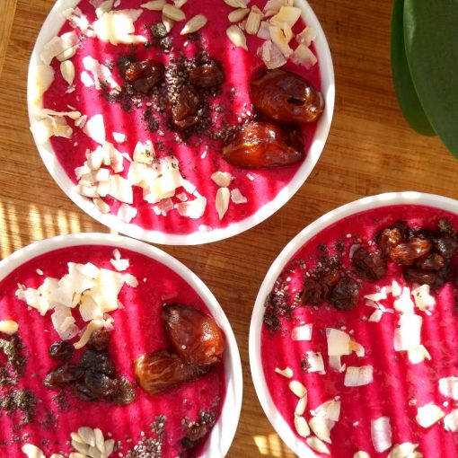 3 pitaya smoothie bowls with toppings